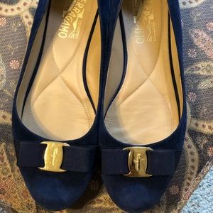 Ladies Navy suede flat shoes.